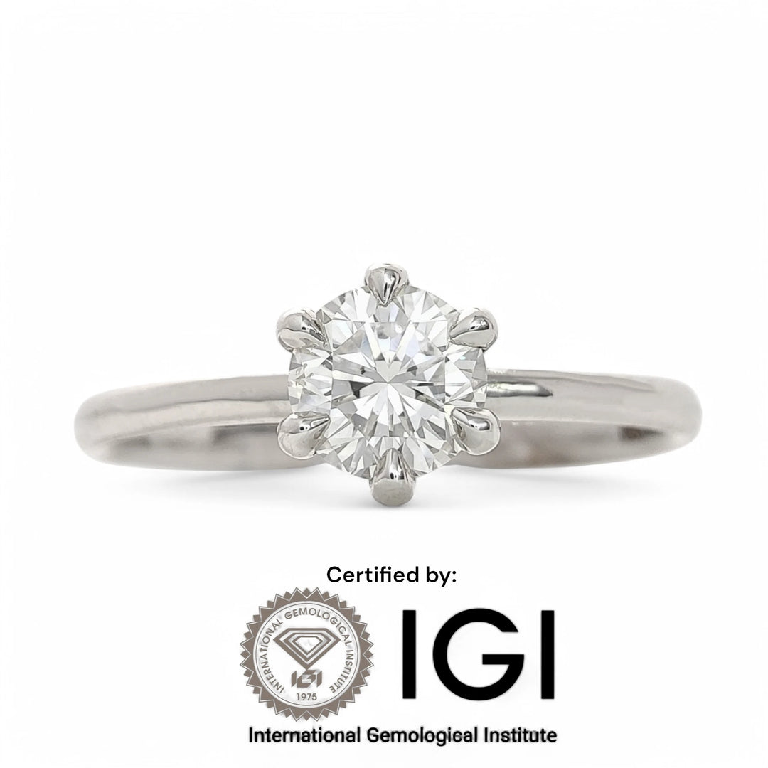 Front view natural diamond solitaire engagement ring in 18k white gold, IGI certified
