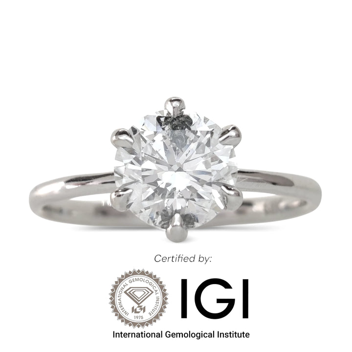 GI certified 0.90ct natural diamond ring with round brilliant cut, white background