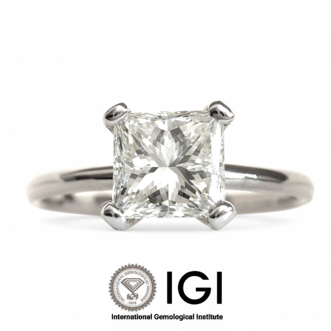 Close-up front view of a 0.76ct IGI certified princess cut diamond ring in 18K white gold front view