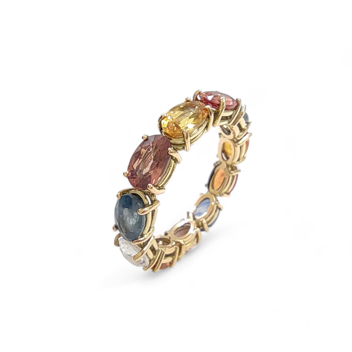14k yellow gold infinity ring for women with multicolor oval-cut sapphires - perspective view