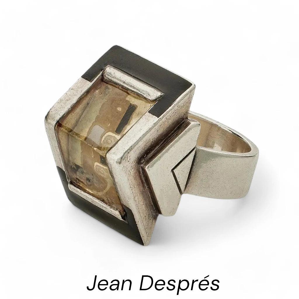 Jean Després' ring: A stunning piece of jewelry featuring intricate design and craftsmanship, showcasing the elegance and sophistication of Després' work