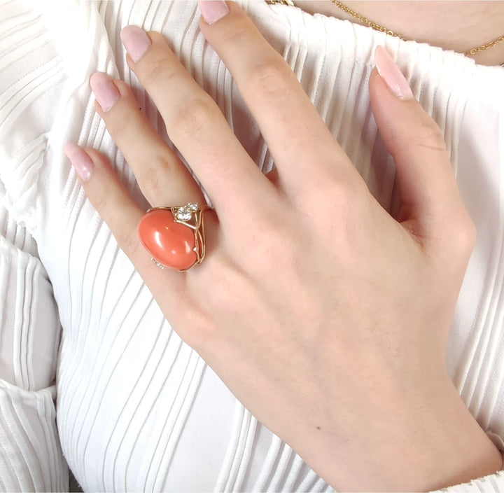 coral ring pose 1, gold jewelry, model hand, stylish ring, luxury accessory