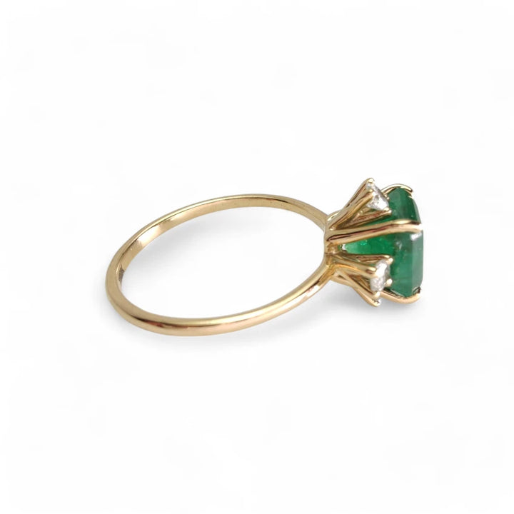 Right-side view of the 18K gold octagon emerald engagement ring, a perfect Christmas or engagement gift