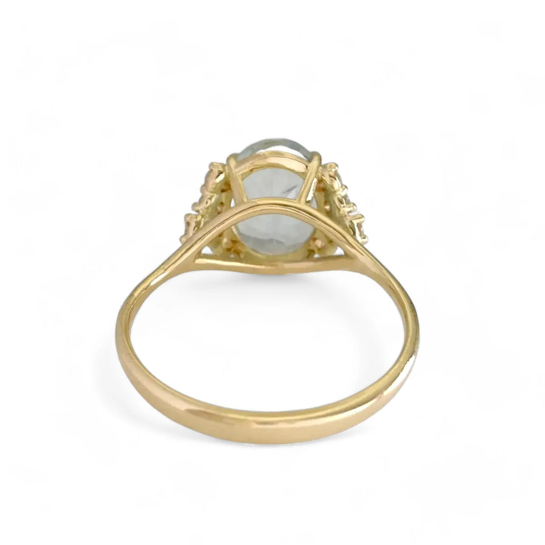 Elegant 18K Gold Oval Aquamarine and Diamond Accent Ring