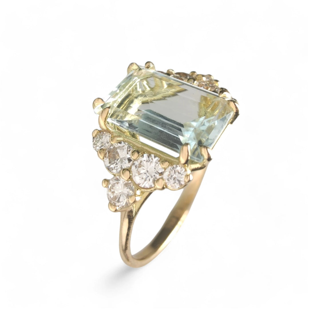 Cover photo of an aquamarine engagement ring in 18K gold with diamonds, part of the aquamarine collection, perfect for Christmas or engagements