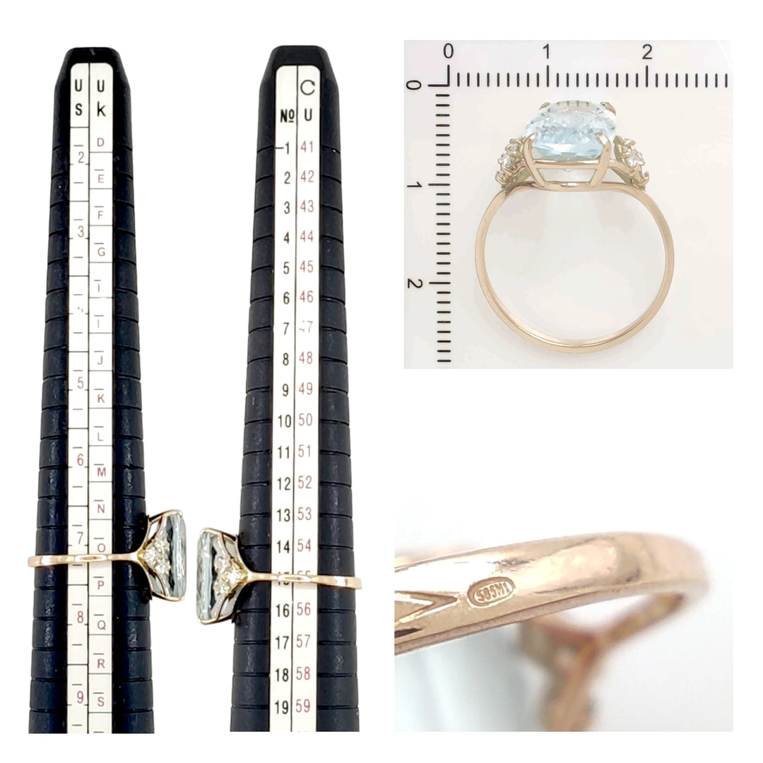 Measurement scale and size chart for a handcrafted fine jewelry ring in 14K yellow gold with an aquamarine centerpiece and diamonds in a V-shaped arrangement