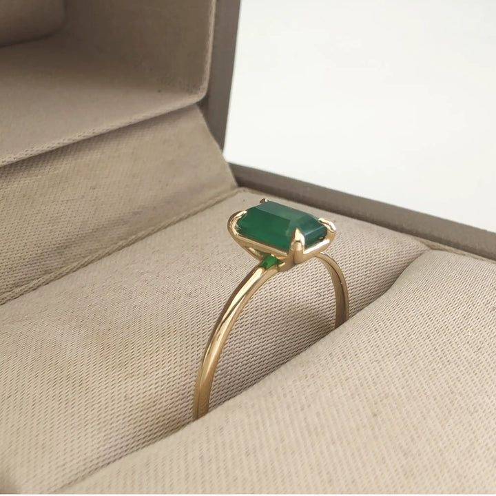 18K yellow gold solitaire emerald engagement ring presented inside a jewelry box, perfect for proposals, Christmas, or Black Friday deals