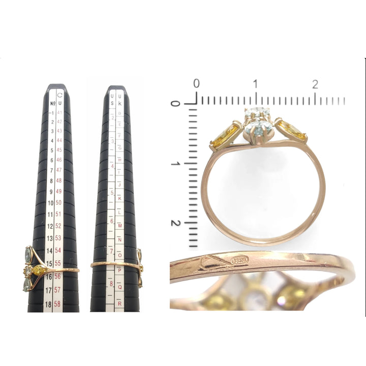 Measurement and size chart for a 14K yellow gold engagement ring with a central incolor diamond and blue and yellow marquise diamonds, ensuring the perfect fit and quality for the recipient