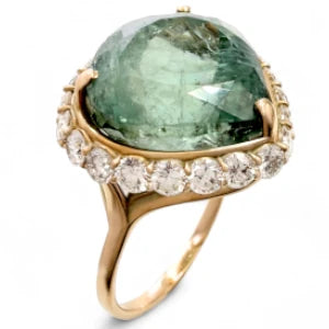 A spectacular 14K yellow gold ring featuring a large pear-cut green tourmaline encircled by a halo of diamonds, perfect as a luxurious gift for Christmas or special occasions for a mother, grandmother, or girlfriend.