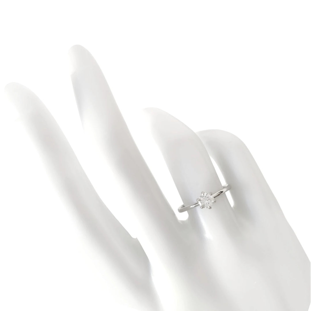 Natural diamond engagement ring on mannequin hand – elegance shown