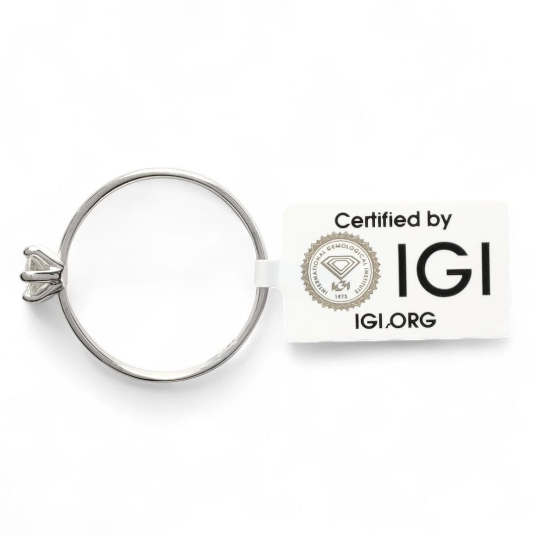 IGI certified diamond solitaire ring with official certification tag