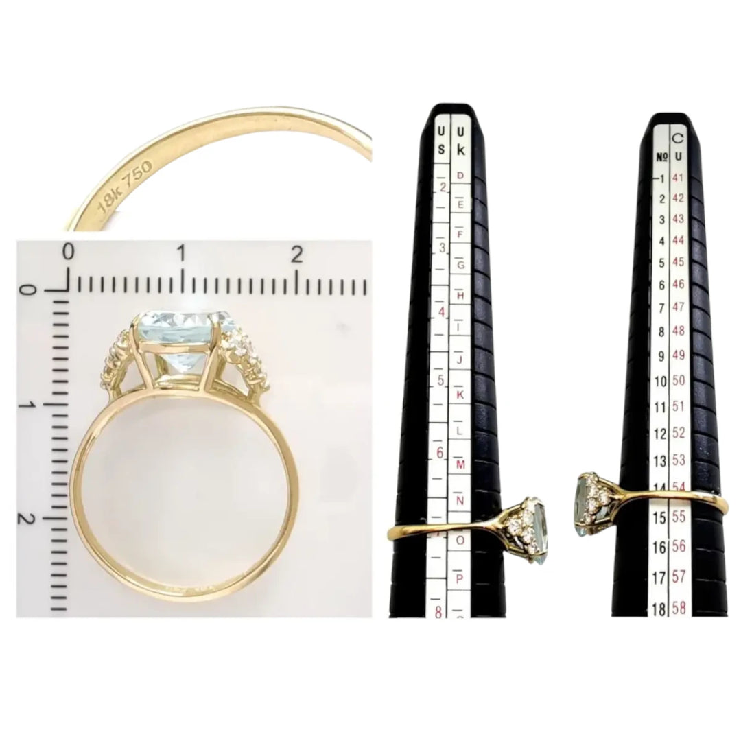 Measurement scale and size chart for a luxurious 18K yellow gold engagement ring featuring a natural oval aquamarine and brilliant diamonds, perfect for ensuring the right fit.