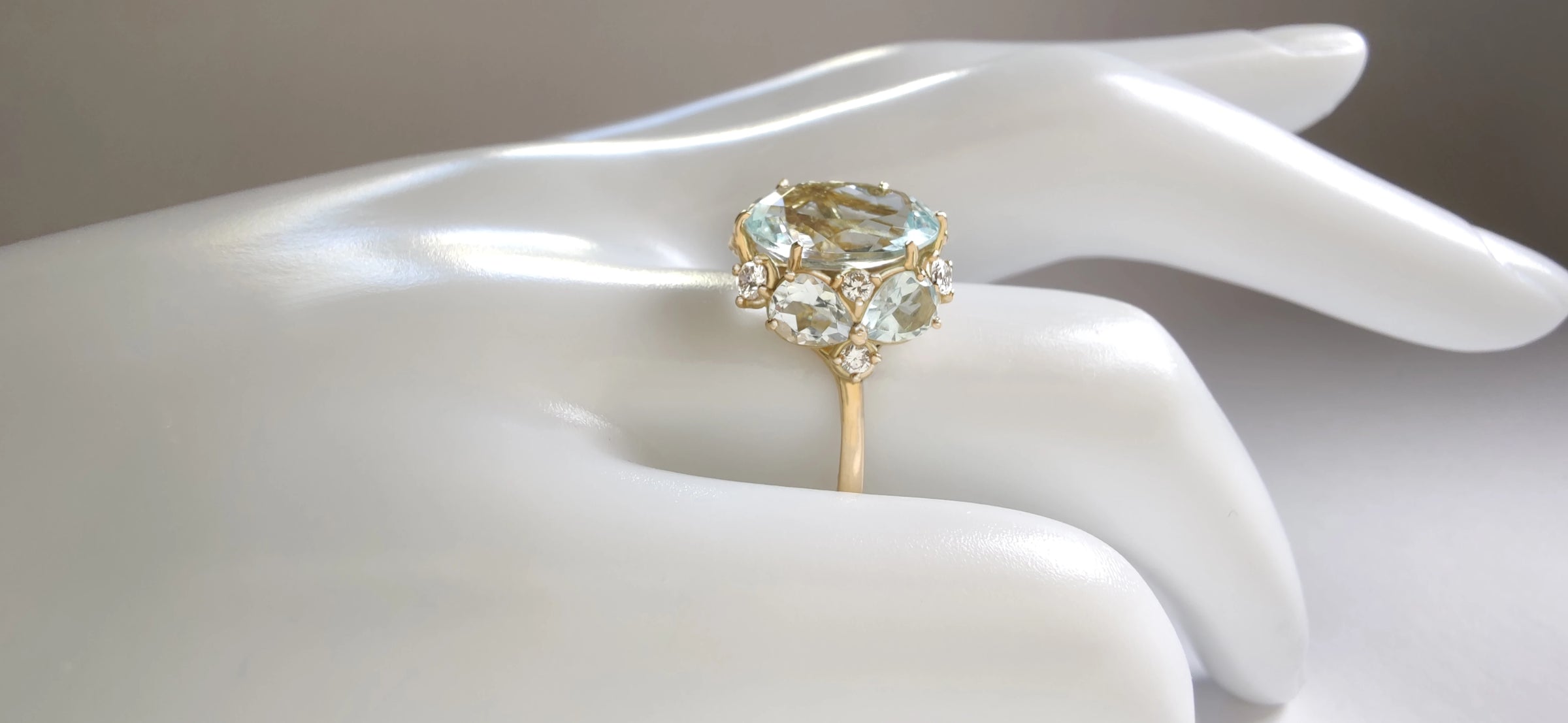 aquamarine  an diamond ring in hand, 18k yellow gold , genuine aquamarine