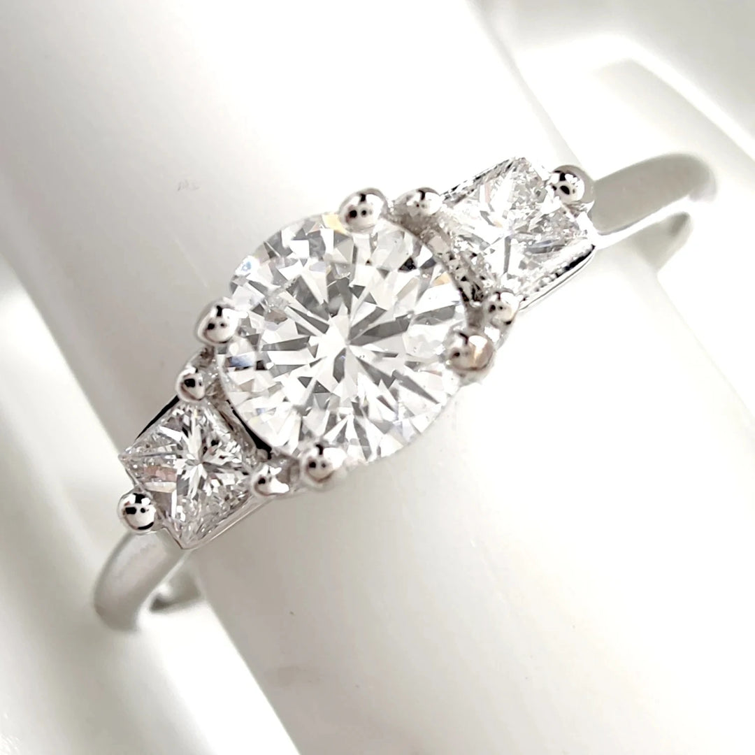 Elegant white gold ring showcasing a heart-shaped diamond surrounded by smaller diamonds, symbolizing love and romance. This unique design is ideal for those who want to make a bold statement with their jewelry